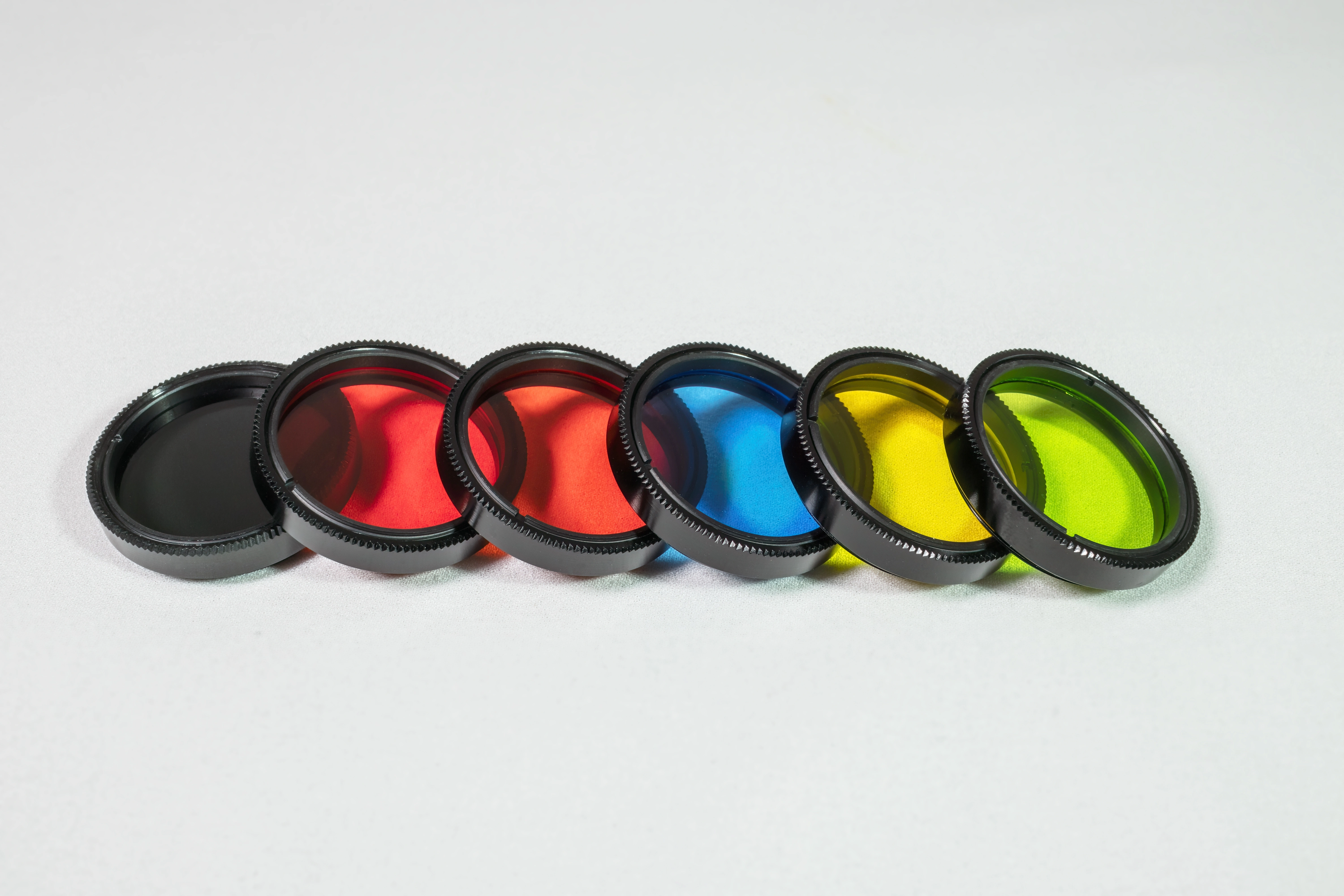 Optical filters, Neutral density filters, Anti-reflective coatings, Color filters Polarizing Filters