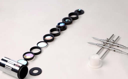 High-NA objective lens for ion trap experiments, Objective for Ion Trapping