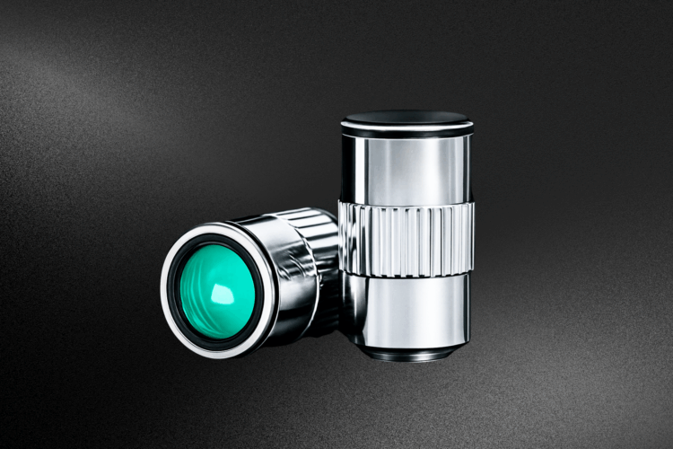 Why Conventional Microscope Objectives Fail in Quantum Experiments